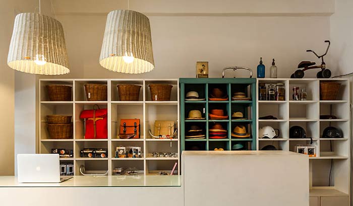 工業(yè)元素自行車(chē)店鋪前臺(tái)背景墻裝修設(shè)計(jì)案例效果圖